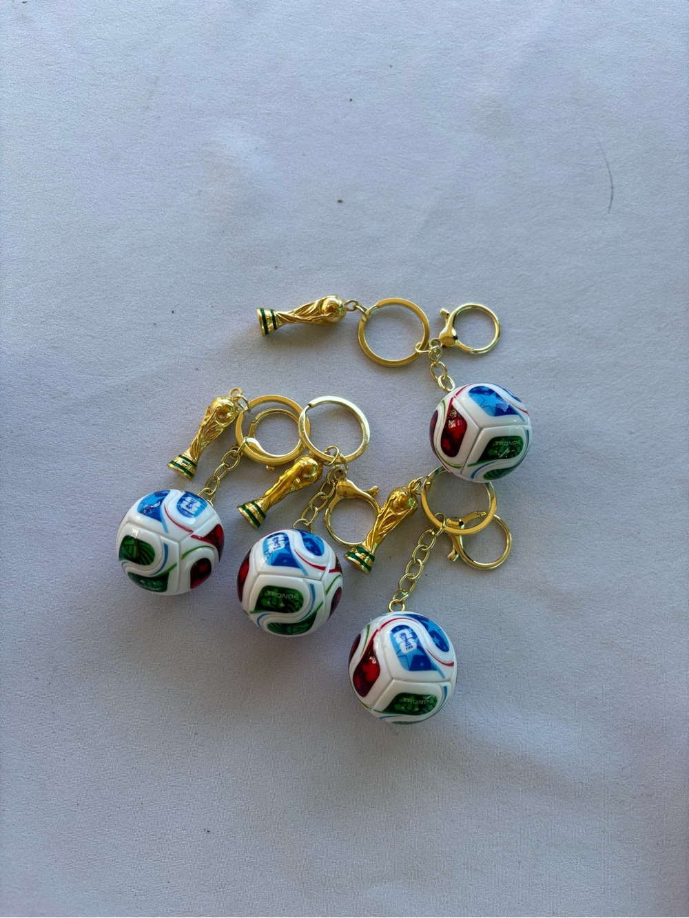 2026 Gold Tone World Cup Trophy & Soccer Ball Keychains - Multicolor bundle 4 pc